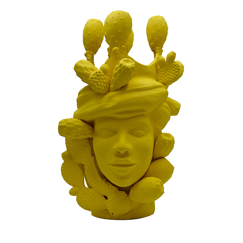 Жёлтая скульптура Moor's Head